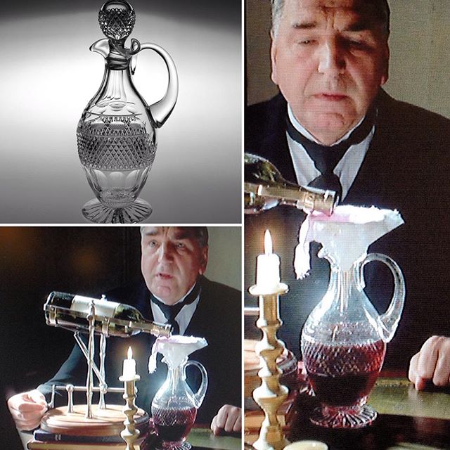 Mr Carson decants the claret into a crystal claret decanter